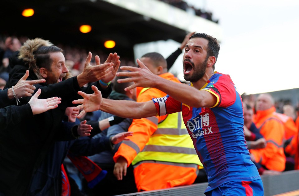 Luka Milivojevic celebrated with fans after his late penalty equaliser