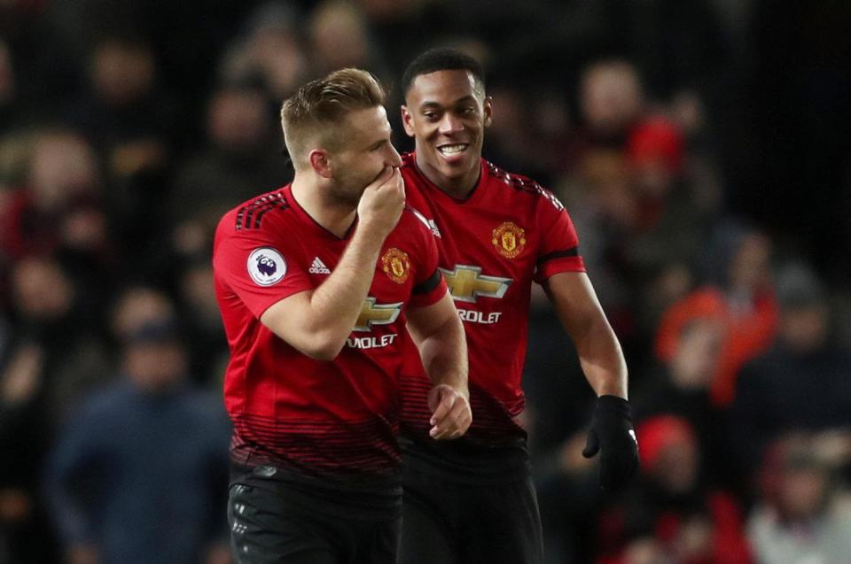  Luke Shaw shares a joke with Anthony Martial during Everton win