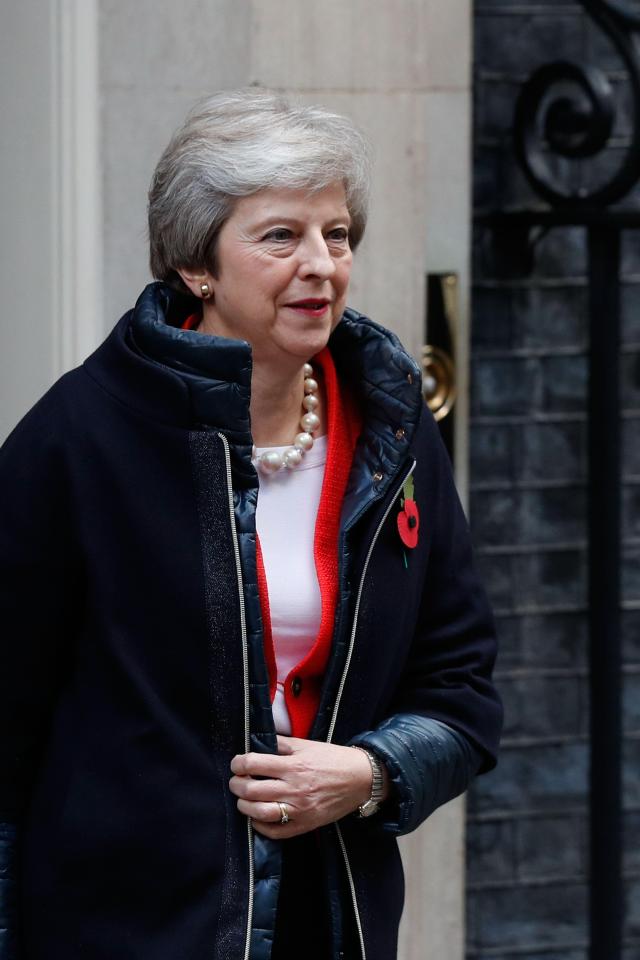  Prime Minister Theresa May leaves 10 Downing Street in London ahead of the presentation of the Government's annual budget to Parliament