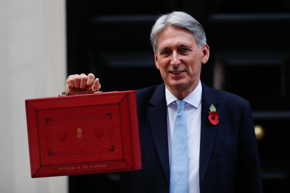 Philip Hammond leaving Downing Street on his way to deliver the Budget