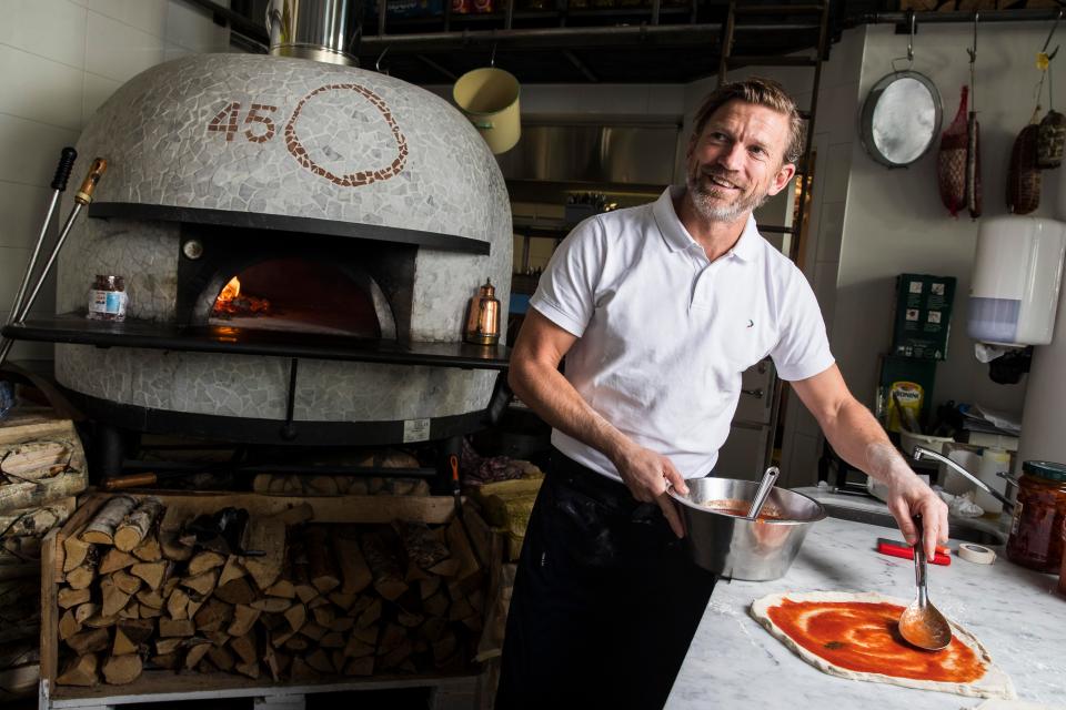  The wood-burning oven in Blomqvist's restaurant is set at 450 degrees and takes two hours to heat up