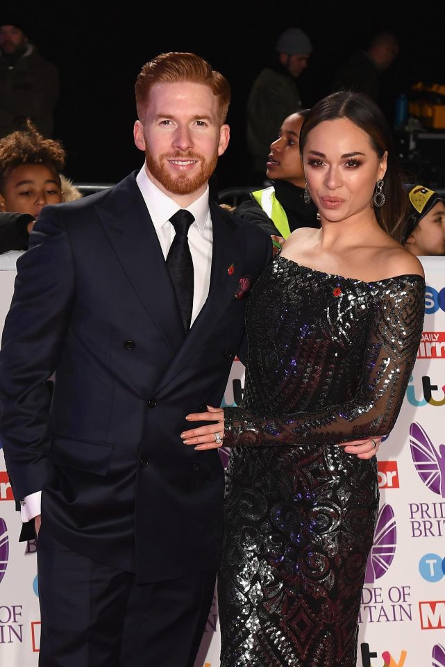  Katya Jones and husband Neil put on a defiantly loved up display on the red carpet at the Pride Of Britain Awards tonight