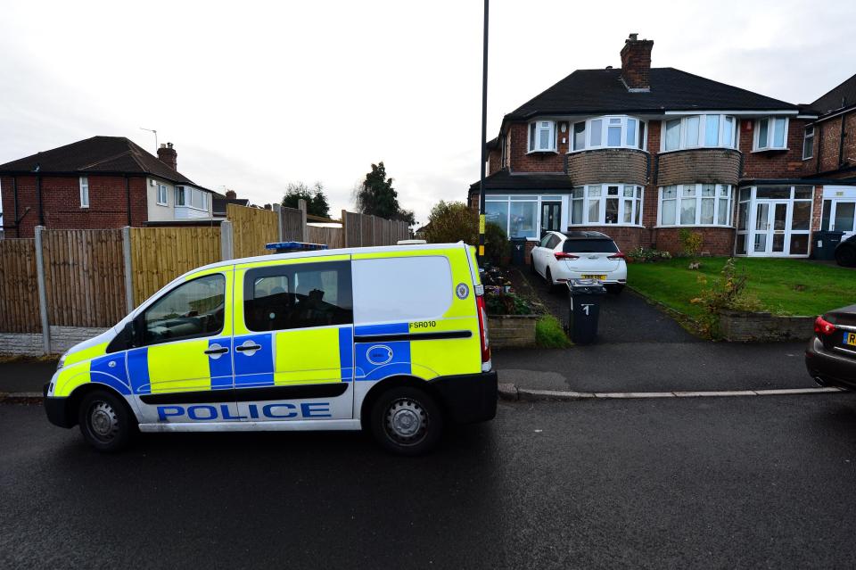  Police were today pictured searching the garden of the property