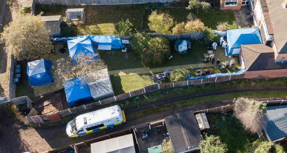 The new tent by the kitchen window suggests the police are widening their search