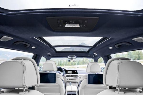 The interior is uber luxurious, including suede-style roof lining