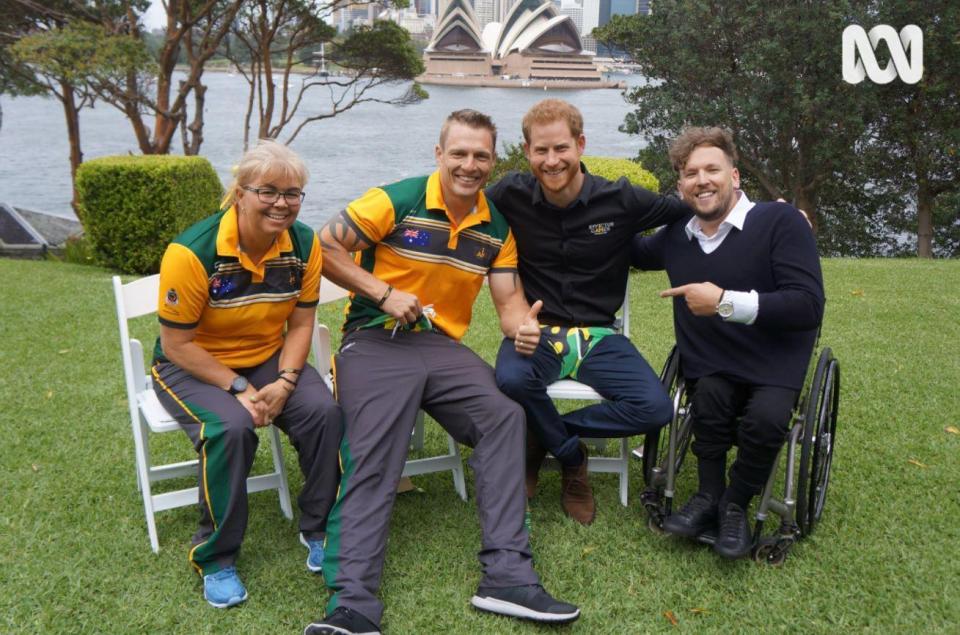  Prince Harry squeezes into budgie smugglers after being goaded by Oz athletes