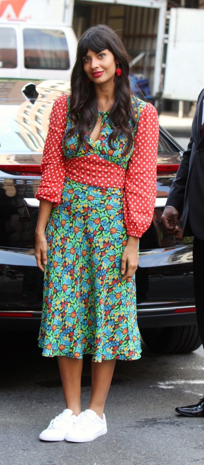 Jameela Jamil, 32, nails dressy casual with a clashing prints dress and street trainers