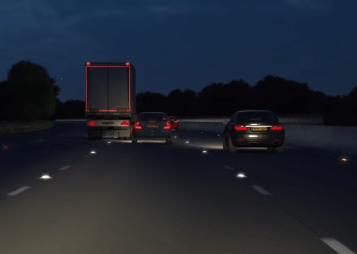 A lorry almost slams into the car in front, forcing it to brake hard in front of you, while driving on the motorway at night