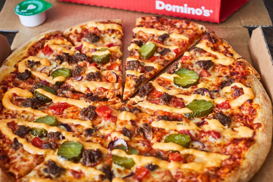 Domino's has launched a CHEESEBURGER pizza that is drizzled with burger cheese sauce