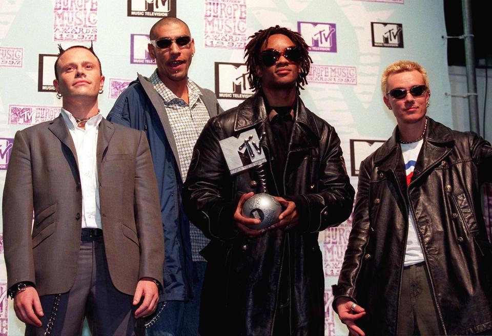  As three-time MTV European Music Award winners, band members pose backstage in Rotterdam in 1997