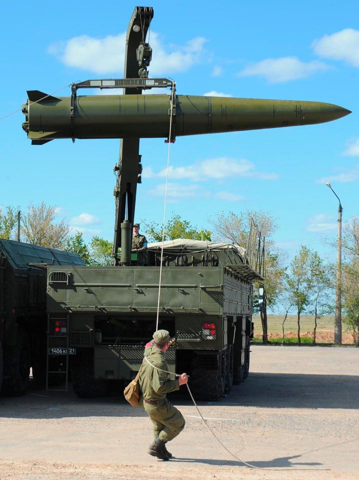  A rocket being loaded into an Iskander-M missile launcher