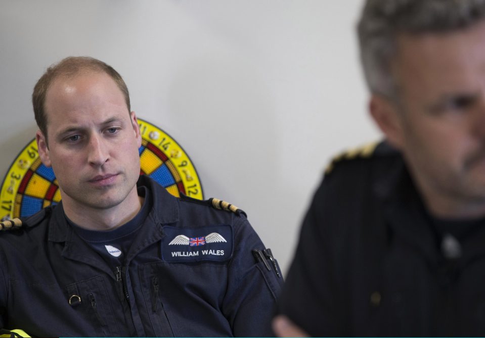 Prince William, Duke of Cambridge is seen in the briefing room with the crew as he starts his final shift in July last year