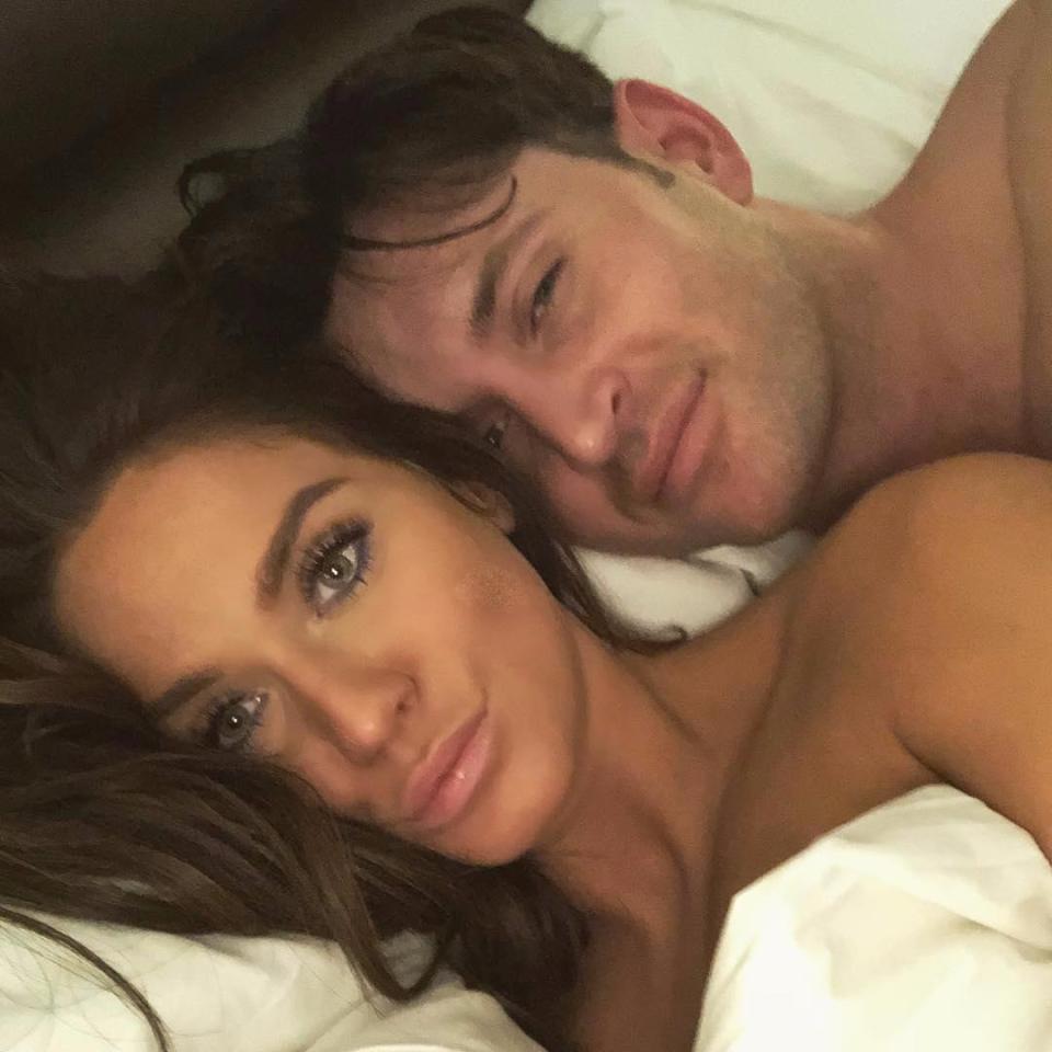  Vicky posts a happy snap of herself and John lazing in bed