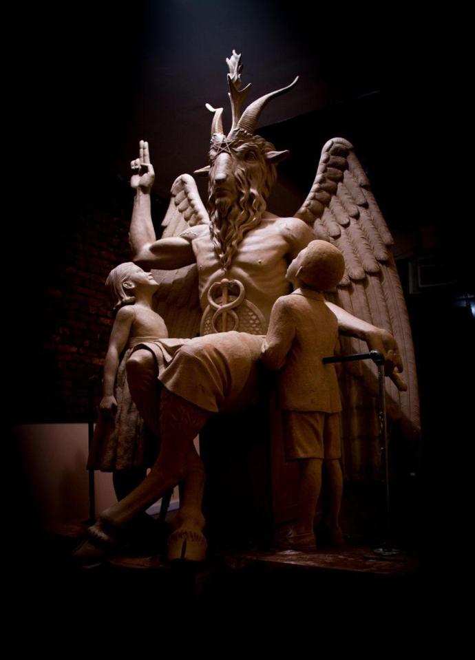  The Satanic Temple's statue - the group is suing Netflix and Warner Bros for $50 million (£38 million), claiming they copied their version of the monument