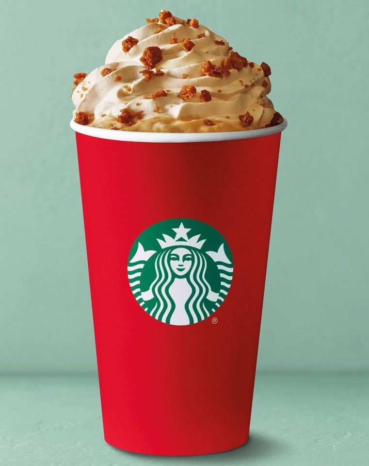 The Gingerbread Latte, pictured in last year's festive red cup - is returning this year 