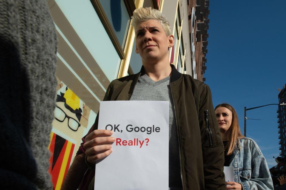  'OK Google, Really?' reads one sign