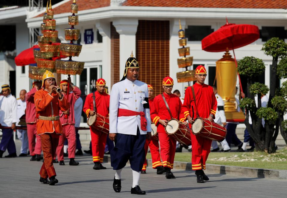  Musicians lead a procession as Vichai Srivaddhanaprabha's funeral begins