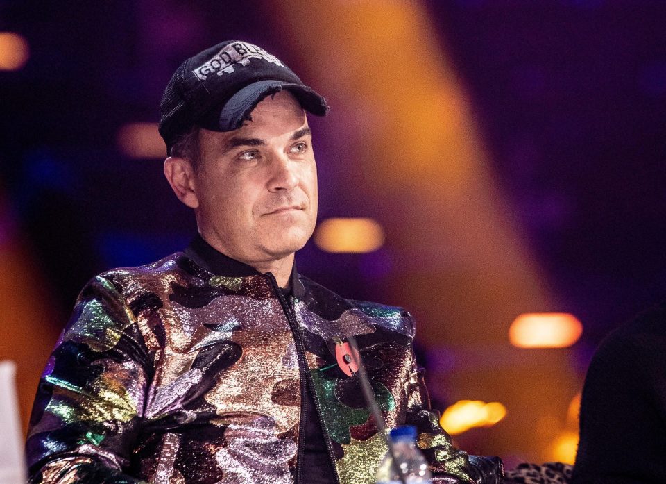  Robbie Williams is at risk of being out of the running to win the X Factor with his act