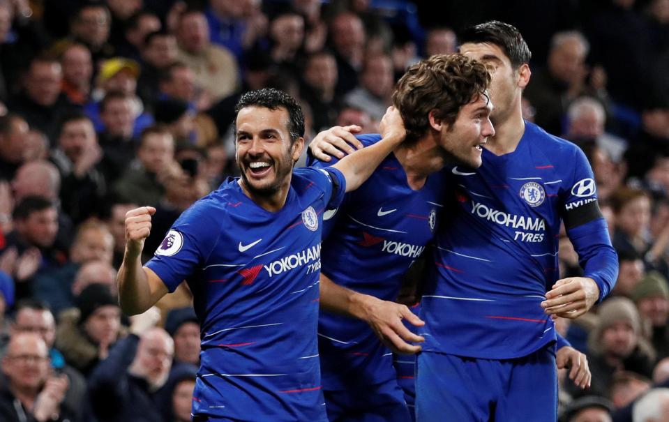  Pedro, left, made it 3-1 to put the icing on the cake for the Blues