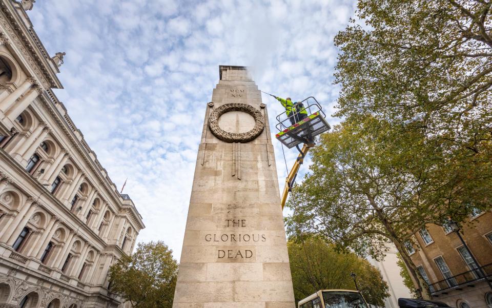  English Heritage workers clean the Cenotaph in Whitehall, central London ahead of the National Service of Remembrance on Sunday 11 November.