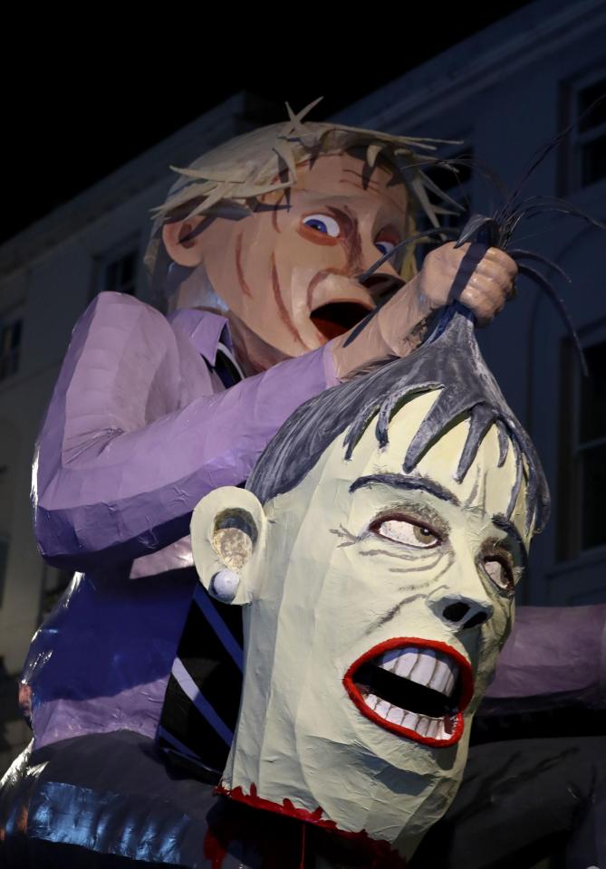  The severed head in 'Boris Johnson's' hand seems to portray Theresa May