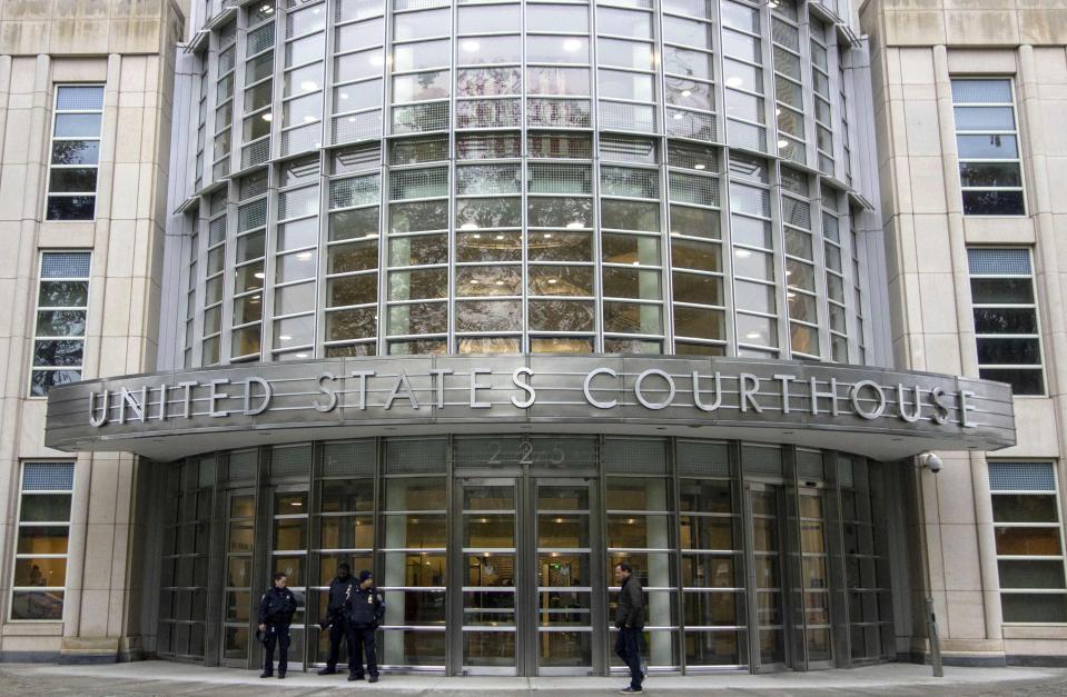  Police guard the courthouse of United States District Court for the Eastern District of New York