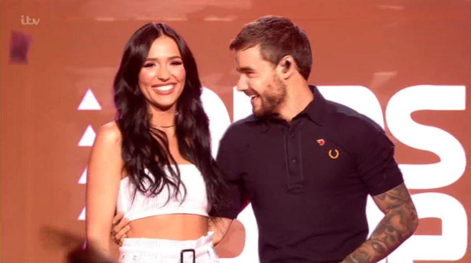  Liam performs new single Polaroid, which was originally supposed to be a duet with his ex-girlfriend, with Canadian singer Lennon, 19, who fans dubbed Cheryl 'lookalike'