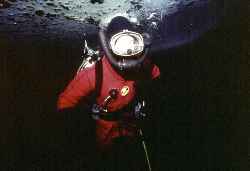  1975: Prince Charles diving under the Arctic ice at Resolute Bay, Canada