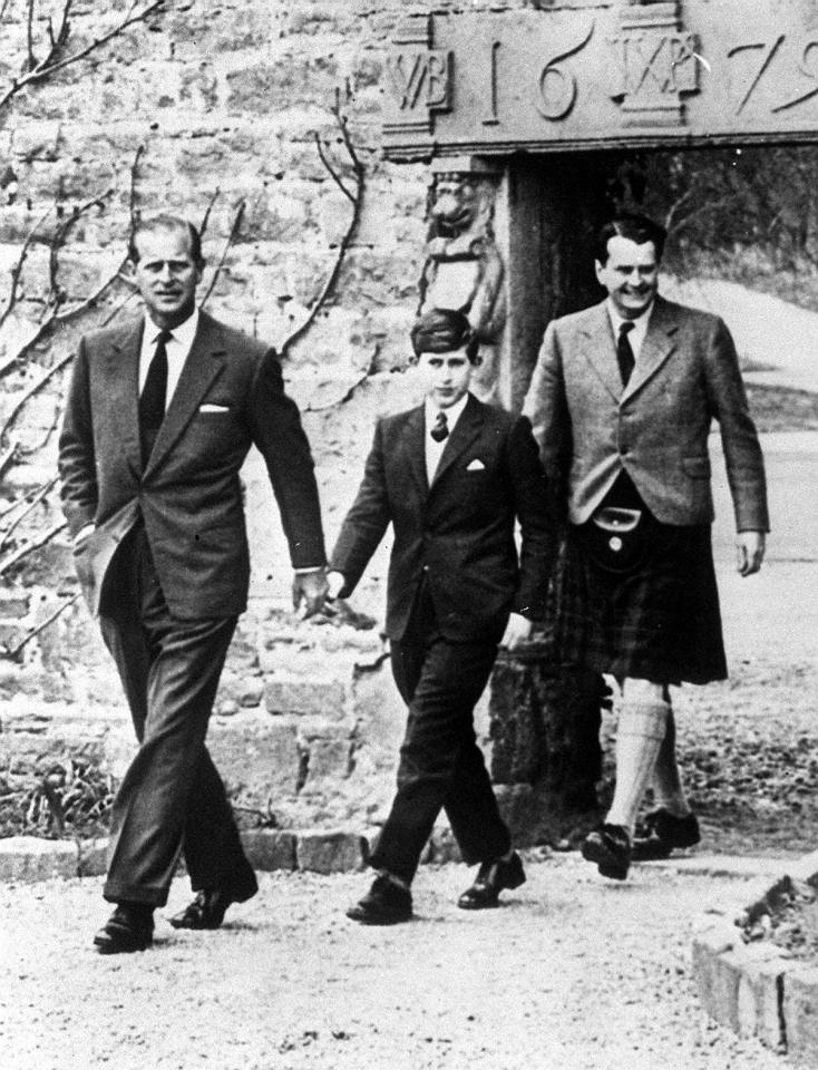  1962: Prince Charles with the Duke of Edinburgh, left, and Captain Iain Tennant arriving at Gordonstoun for the Prince's first day at the public school