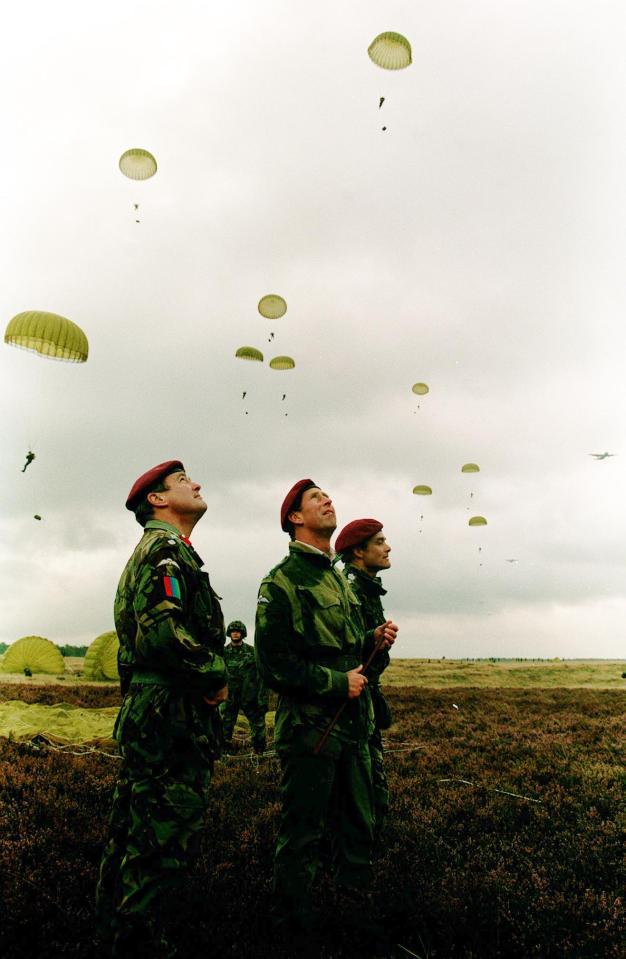  1994: The Prince of Wales watching as British paratroopers fall during the drop on Ginkel Heath to mark the 50th anniversary of the Battle of Arnhem