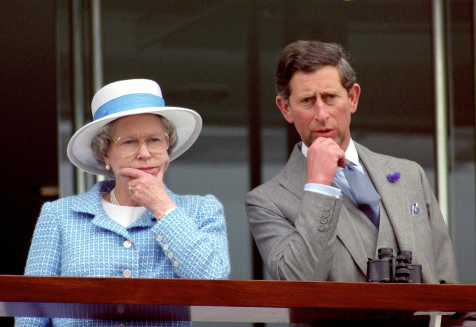  1993: Queen Elizabeth II and the Prince of Wales appearing thoughtful as they watch the races at Epsom, on the 40th anniversary of the Queen's Coronation