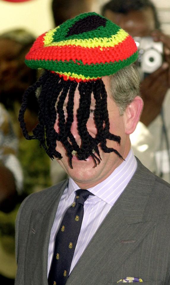  2000: The Prince of Wales laughing with the local Rasta community, as he wears a Rasta hat, at the Trenchtown community centre in Kingston, Jamaica