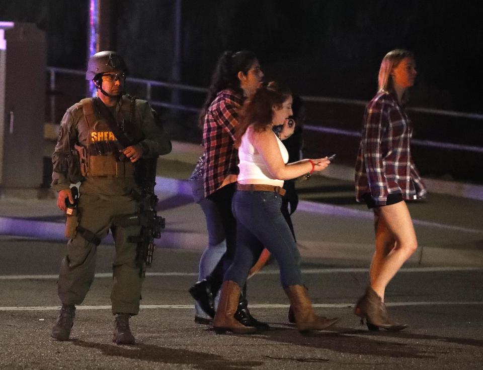  A SWAT team officer near the scene of the mass shooting