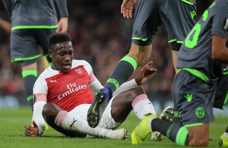 Danny Welbeck was taken off the field on a stretcher after picking up a horrific ankle injury in Arsenals Europa League clash with Sporting Lisbon