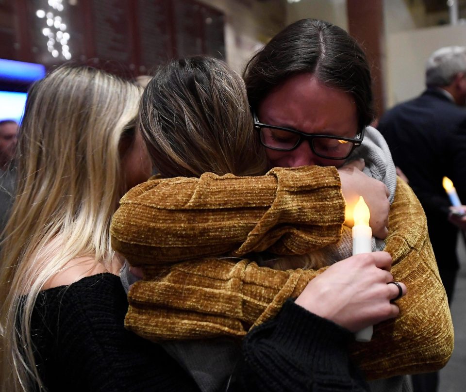 ourners cry and during a vigil for the victims of the mass shooting at the Thousand Oaks Civic Arts Plaza