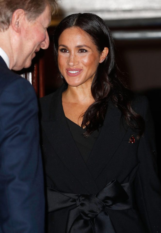  Meghan, the Duchess of Sussex, beams as she is greeted at the Royal Albert Hall