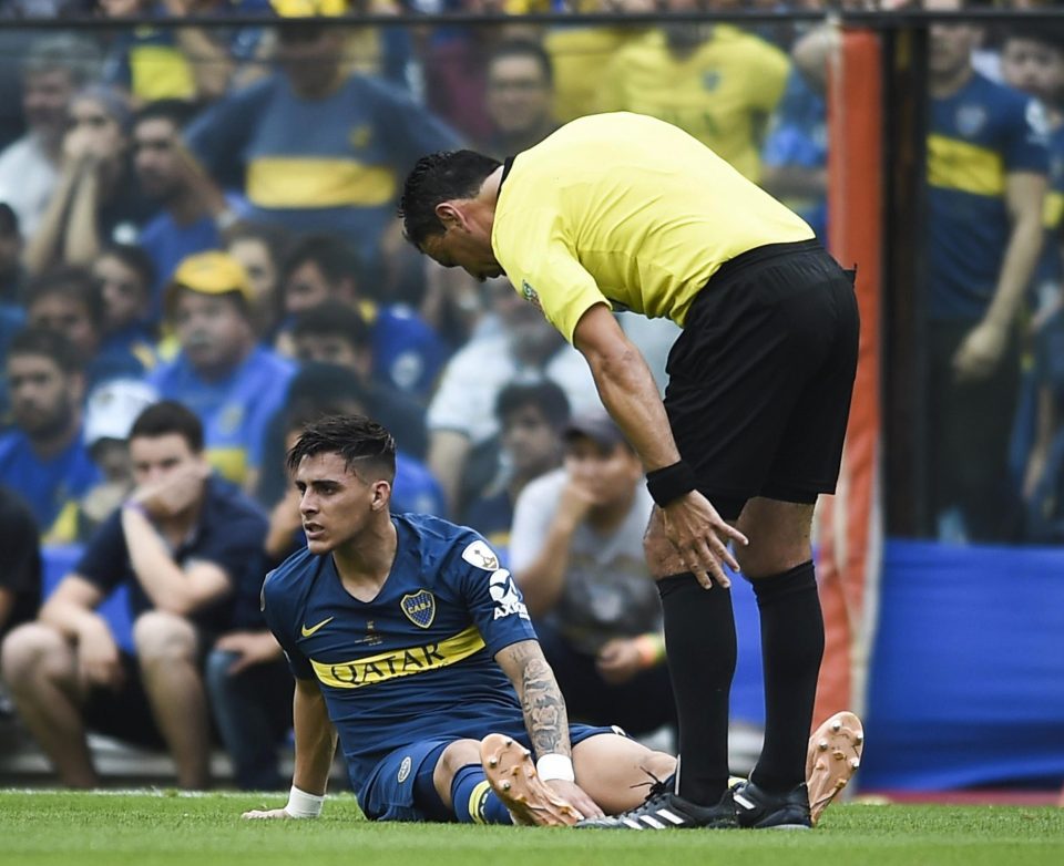 The referee seemed as concerned as his manager would have been as Cristian Pavon was floored