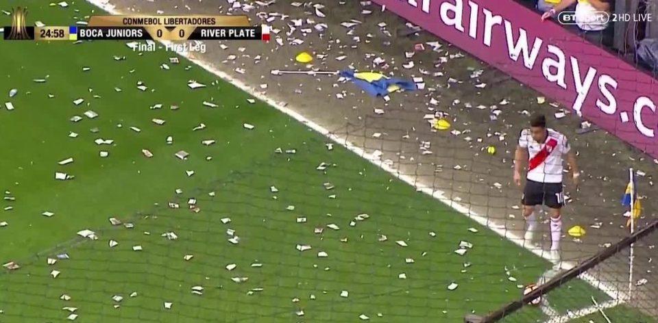 All Gonzalo Martinez could do was wait until the Boca fans had finished their throwing