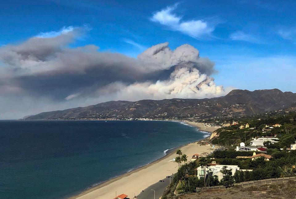 Smoke rising from the Malibu area can be seen from miles away 