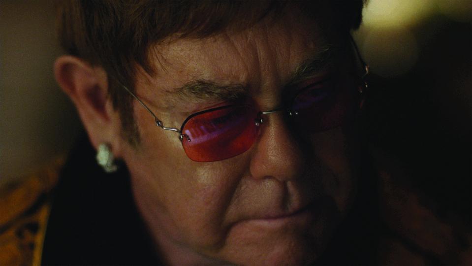  The last shot is Elton reflecting on his life and how he was given a piano as a Christmas present