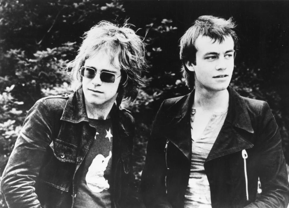  Elton's pal Bernie Taupin (right) wrote the song when he was just 17