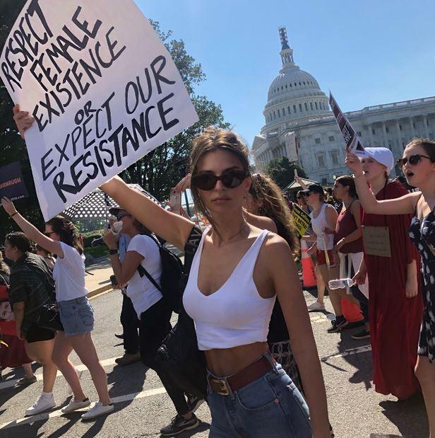  Emily wore a white crop, without a bra, for a protest in Washington