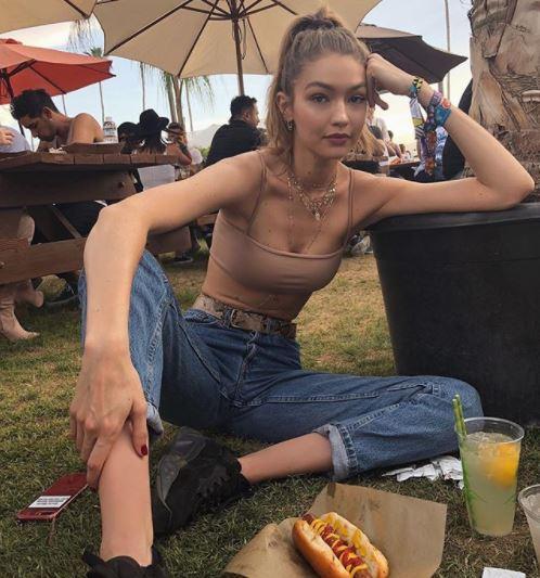  Gigi wears a barely-there crop