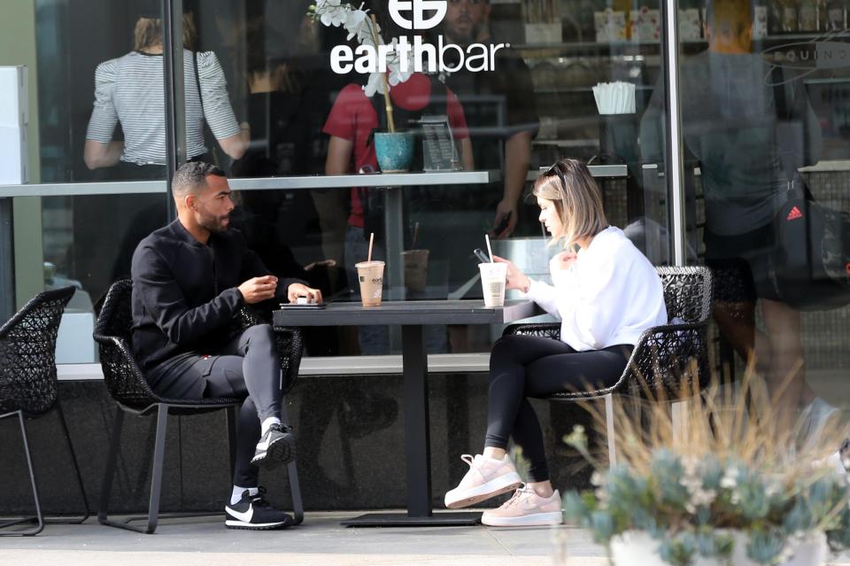  Ashley Cole and Sharon Canu drinking outside Earth Bar in Los Angeles