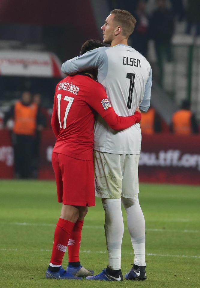  Goalkeeper Robin Olsen consoles Cengiz Under after Turkey were relegated