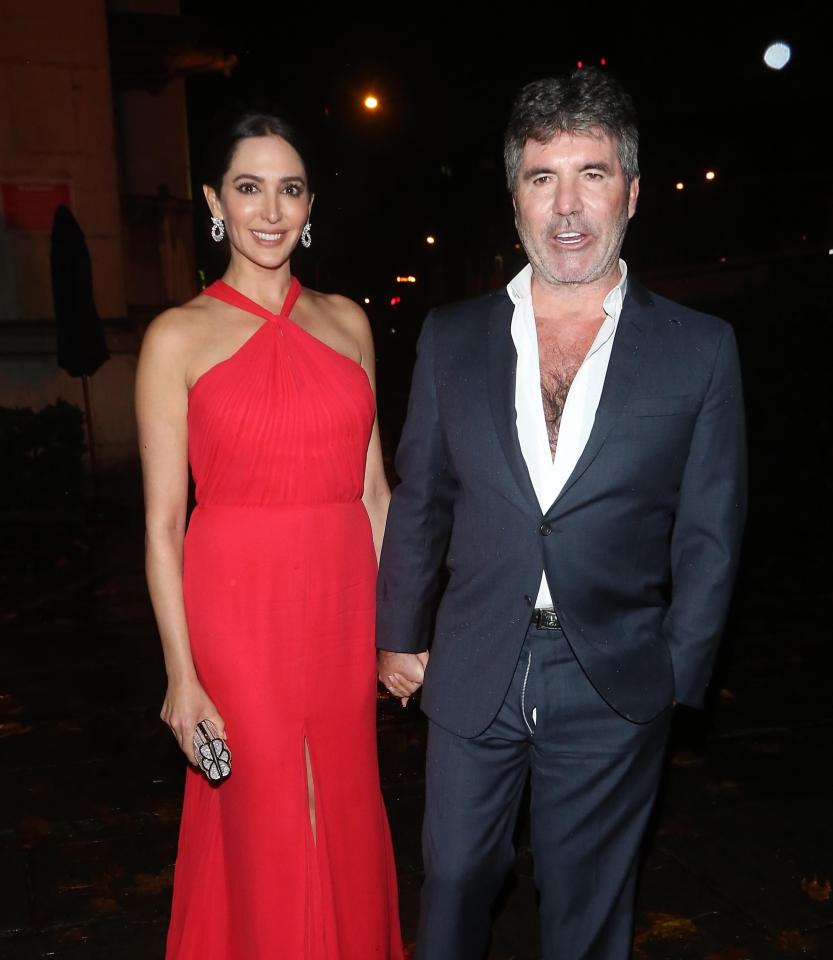  Simon Cowell left a charity ball with his shirt unbuttoned and flies undone