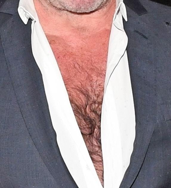  Simon wasn't afraid to flash his hairy chest