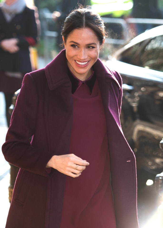 Meghan added a touch of edginess to her outfit with a sweet slogan ring from LA designer Meredith Hahn