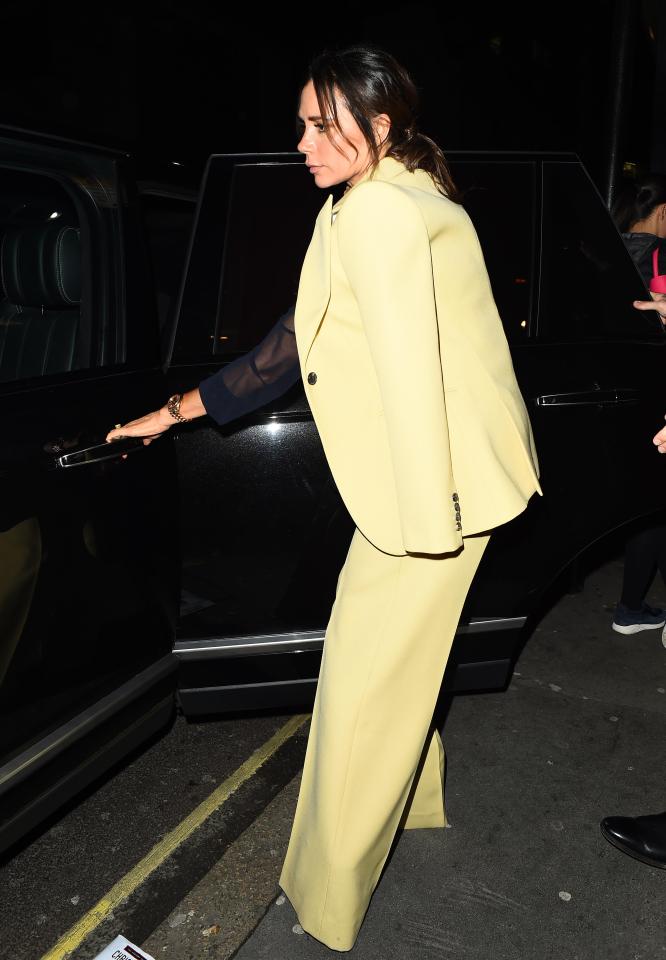  Victoria Beckham turned heads in an over-sized yellow suit on a rare dinner date with David after marriage split speculation