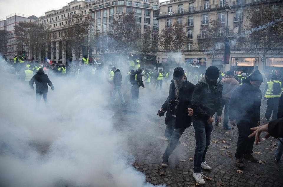  Violence has erupted on the streets of Paris as protesters march against rising fuel prices